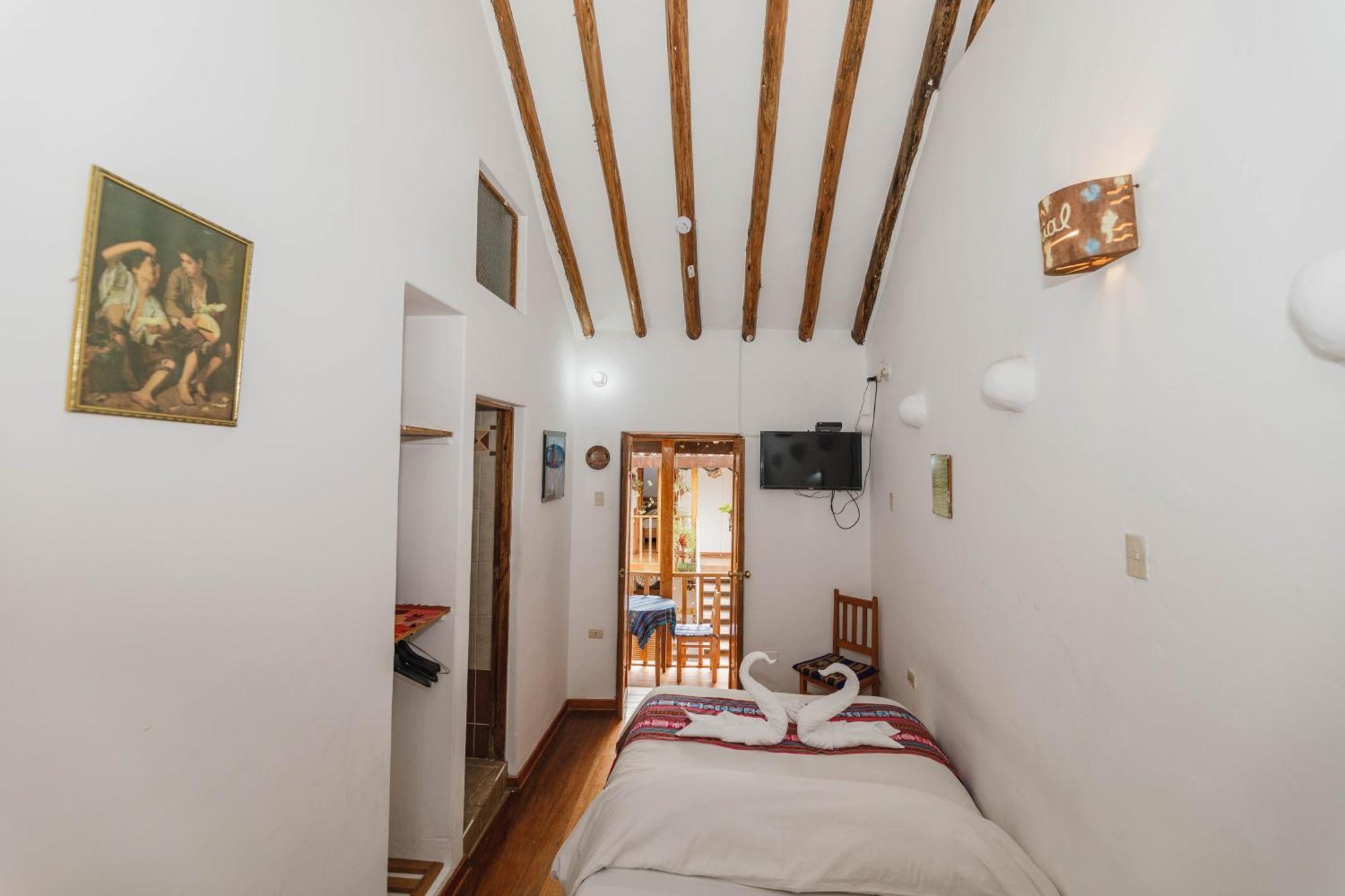 Camera Singola Budget con Bagno in Comune